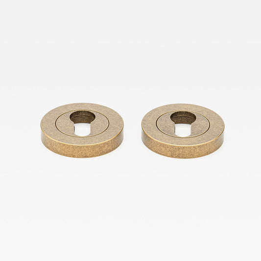 Escutcheon Euro Tumbled Brass — view 1