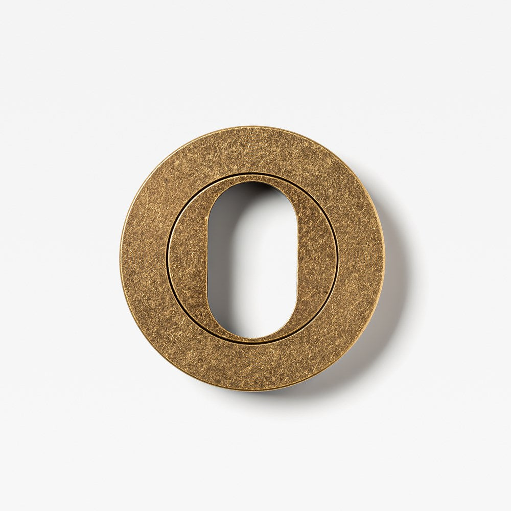 Escutcheon Oval Tumbled Brass — view 2